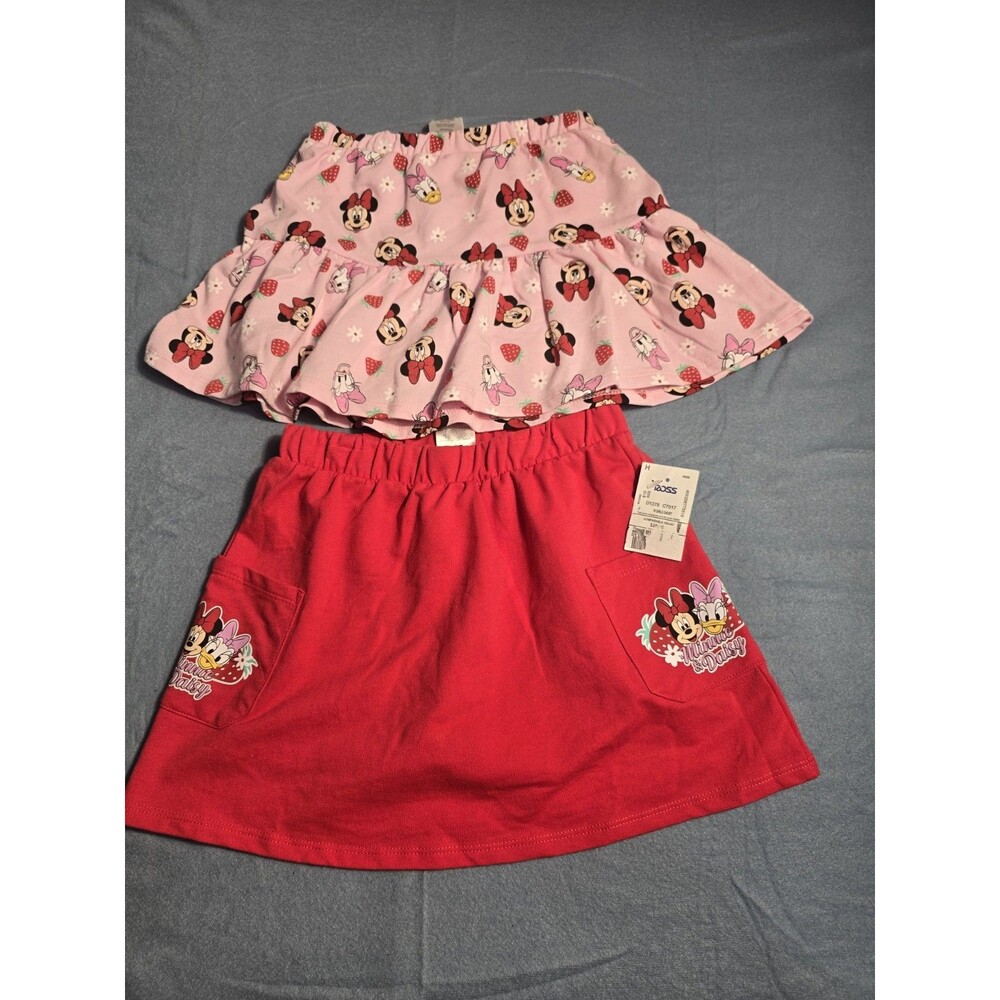 pink Minnie Mouse Skirt  features a strawberry and daisy print, with built-in 6x